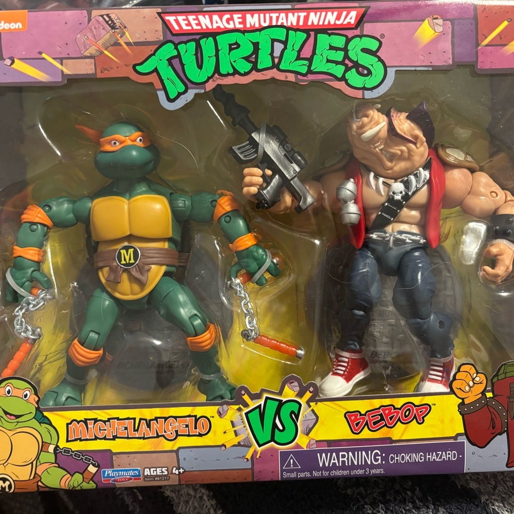 Michelangelo vs Bebop Action Figure Set - Orange & Brown